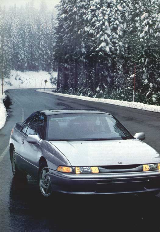 Large pic of silver SVX on a snowy road